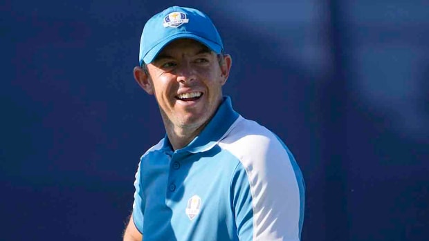Team Europe golfer Rory McIlroy reacts to the video screen on the 6th hole during Day 1 at the 2023 Ryder Cup at Marco Simone Golf and Country Club.